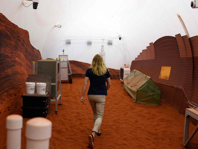 File photo: Dr. Suzanne Bell, Lead for NASA’s Behavioural Health and Performance Laboratory, walks through a simulated Mars exterior portion of the CHAPEA’s Mars Dune Alpha at the Johnson Space center in Houston, Texas. 