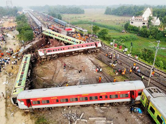 A drone view shows derailed coaches after two passenger trains collided in Balasore district in the eastern state of Odisha, on June 3, 2023. 