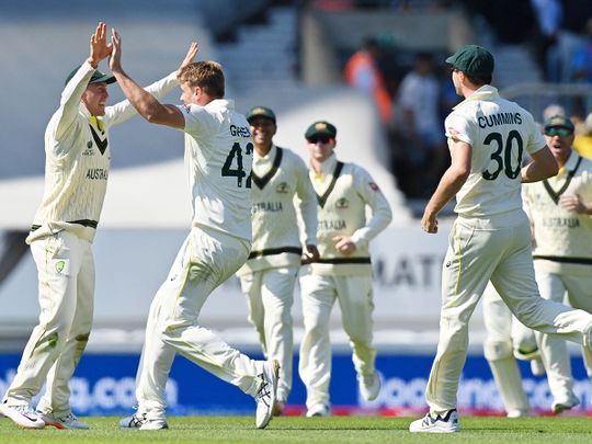 Australia's Cameron Green (2L) celebrates taking the wicket of India's Cheteshwar Pujara 
