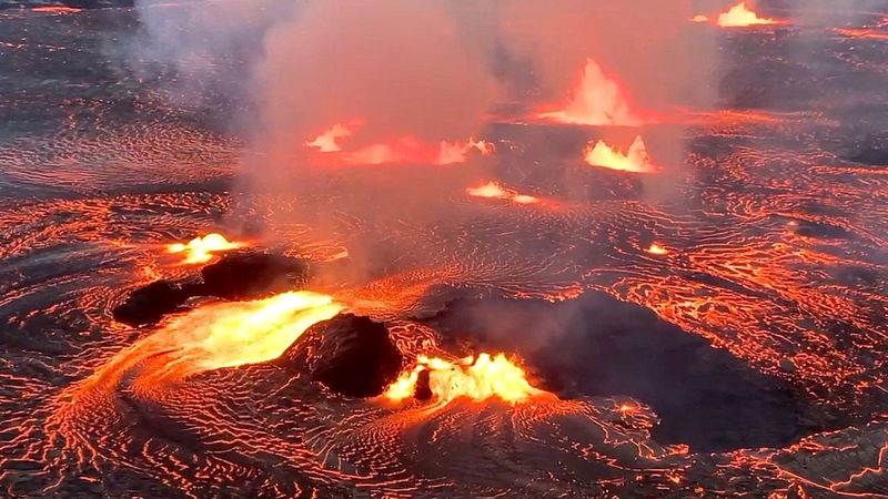 Lava flows on the Halema'uma'u crater floor alongside several active vent sources as the Kilauea volcano erupts in Hawaii, U.S. June 7, 2023. 