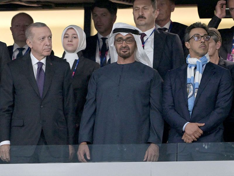 Turkey's President Recep Tayyip Erdogan (left), UAE President His Highness Sheikh Mohamed bin Zayed Al Nahyan (centre) and Sheikh Mansour bin Zayed Al Nahyan (right), UAE Vice-President, Deputy Prime Minister and Minister of the Presidential Court, attend the UEFA Champions League final football match between Inter Milan and Manchester City at the Ataturk Olympic Stadium in Istanbul, on June 10, 2023. 