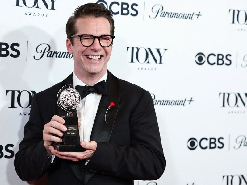 Sean Hayes poses with his award at the 76th Tony Awards.