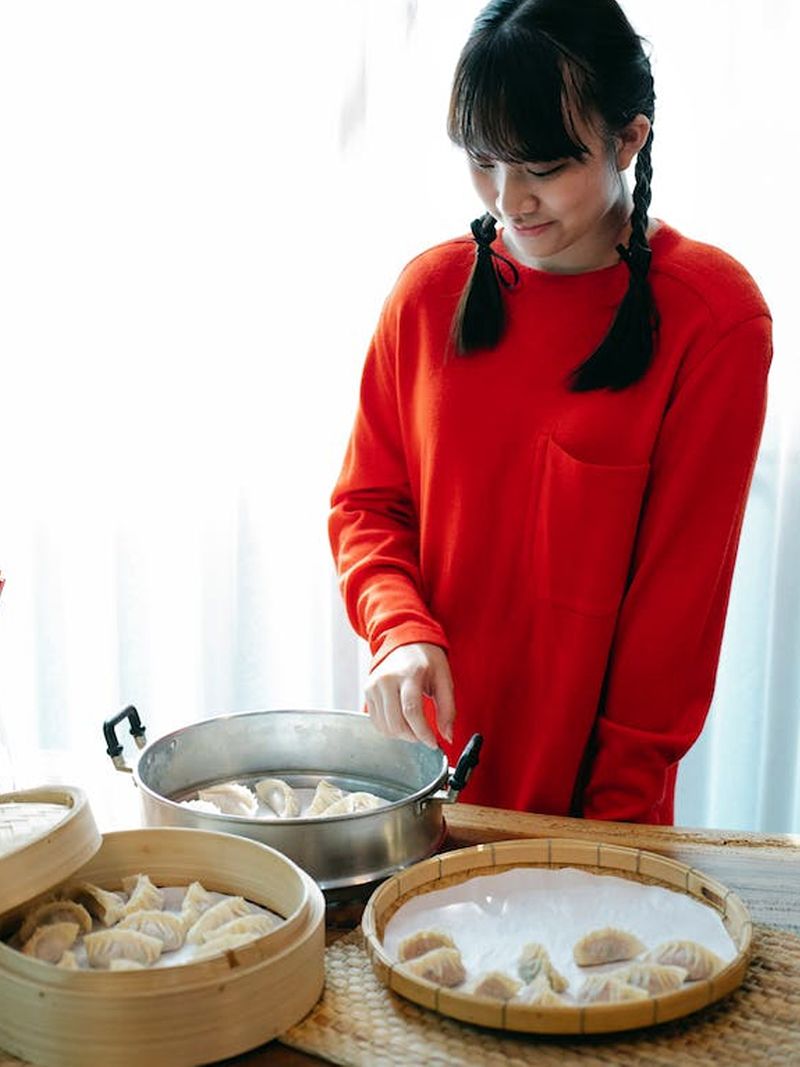 Chinese woman with dumplings