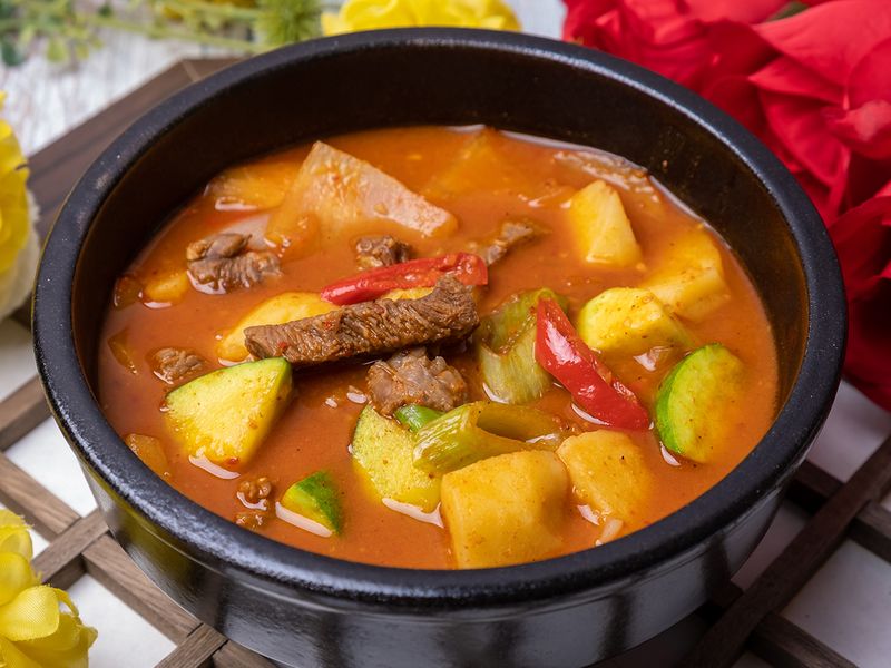 A bowl of potato stew, with gochujang 