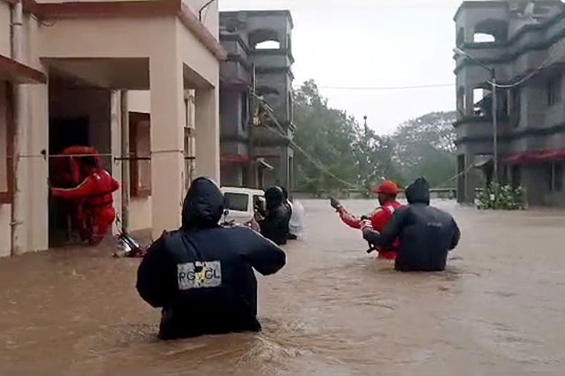 Dwarka, June 16 (ANI): Natural Disaster Response Force (NDRF) team conduct a rescue operation of stranded people from the low-lying areas of Rupen Bandar in Dwarka district after cyclone 'Biparjoy' made landfall, in Dwarka on Friday.