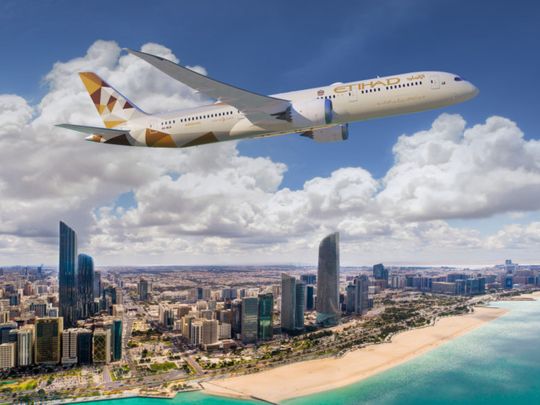 An Etihad Dreamliner flying over Abu Dhabi-1687336526674
