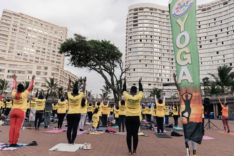 Yoga enthusiasts take part in a mass yoga session at the amphitheatre lawns at North Beach on June 18, 2023 in Durban, South Africa, ahead of the International Day of Yoga.