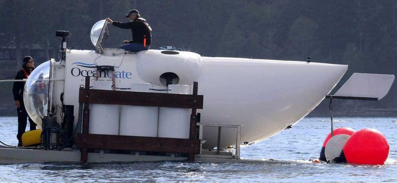 File photo: OceanGate founder and CEO Stockton Rush emerges from the hatch atop the OceanGate submarine Cyclops 1 in the San Juan Islands, Washington, on September 12, 2018. 