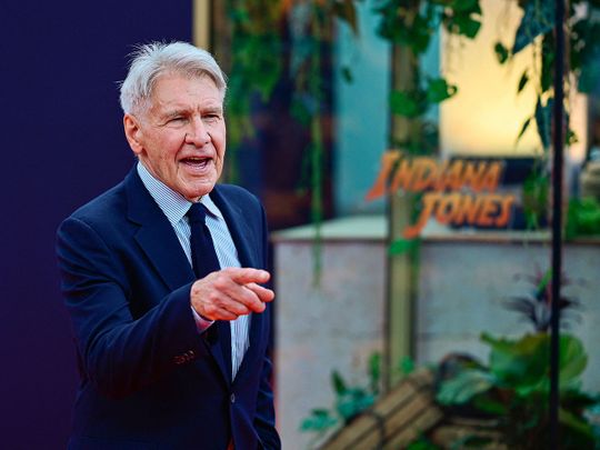 US actor Harrison Ford (C) arrives on the red carpet at the German premiere of Lucasfilm's 