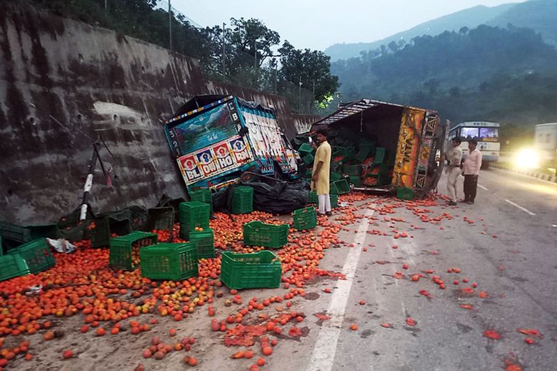 A tomato laden truck met with a road accident on the Chandigarh-Manali highway, near Sunder Nagar in Mandi on Wednesday. Seven persons injured severely in the incident.
