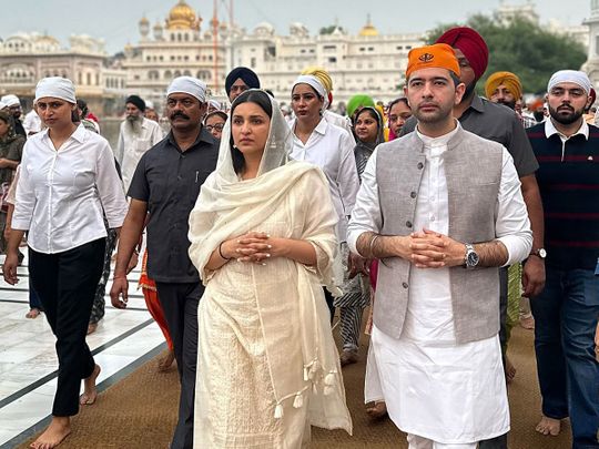 Bollywood actress Parineeti Chopra with her politician fiance Raghav Chadha at the Golden Temple in Amritsar.