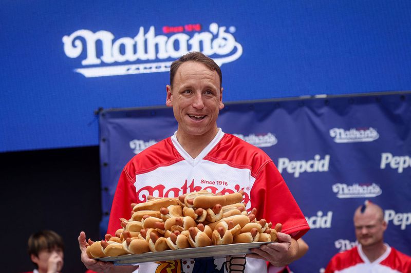 World Champion Joey Chestnut during the weigh-in ceremony ahead of  2023 Nathan's Famous Fourth of July International Hot Dog Eating Contest in Coney Island Brooklyn in New York City, U.S., July 3, 2023.
