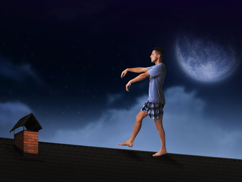 Man sleepwalking on the roof