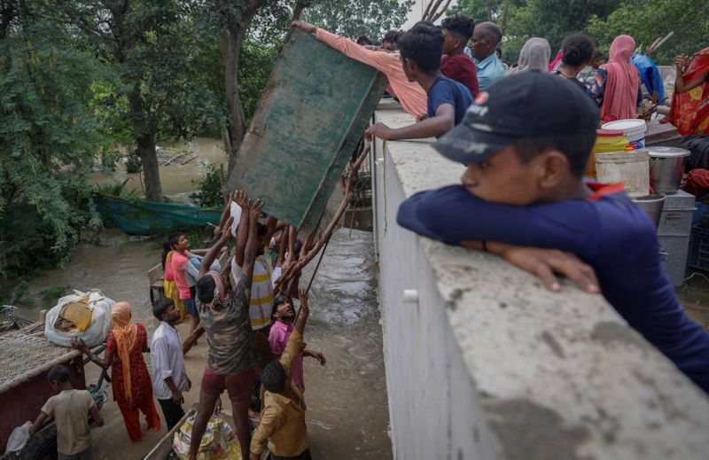 Copy of 2023-07-12T105534Z_96590390_RC2J12AR6WFP_RTRMADP_3_ASIA-WEATHER-INDIA-MONSOON-1689228061324