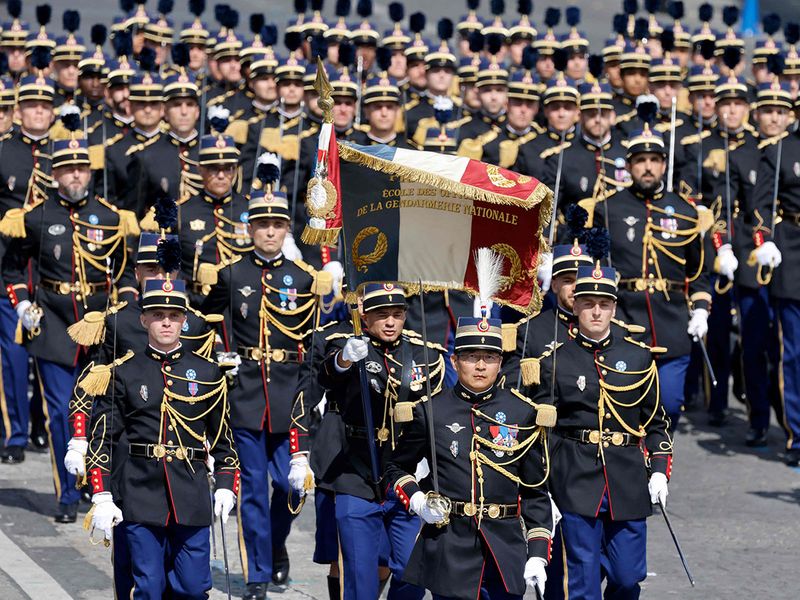 Photos: France celebrates Bastille Day with parade, tribute to India ...