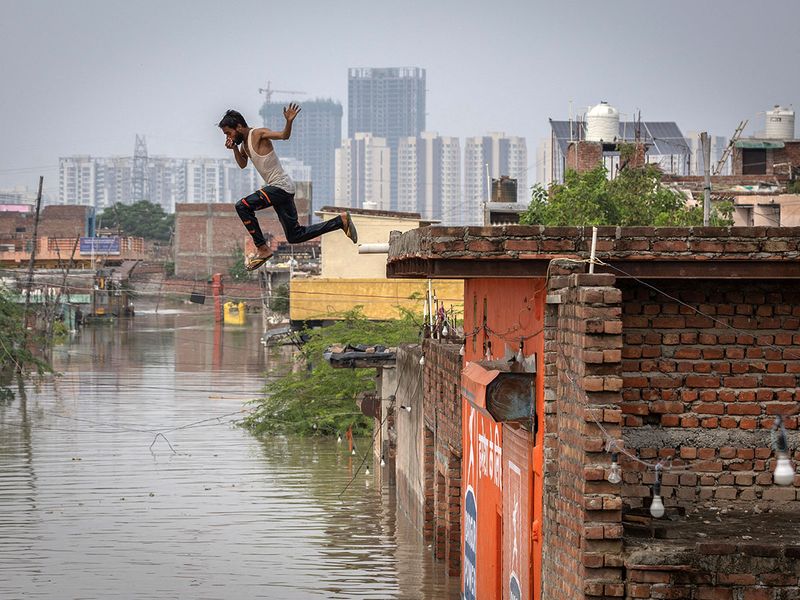 2023-07-14T125355Z_1892455634_RC2Y22AEJTBG_RTRMADP_3_ASIA-WEATHER-INDIA-MONSOON