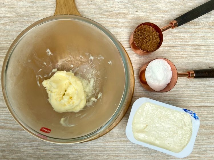 In a bowl, place butter and cream cheese which is at room temperature