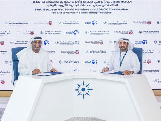 Captain Ammar Al Shaiba, Acting CEO, Maritime Cluster of AD Ports Group and Eng. Bader Saeed Al Lamki, CEO of ADNOC Distribution sign a partnership agreement to develop marine refuelling stations across the Emirate 