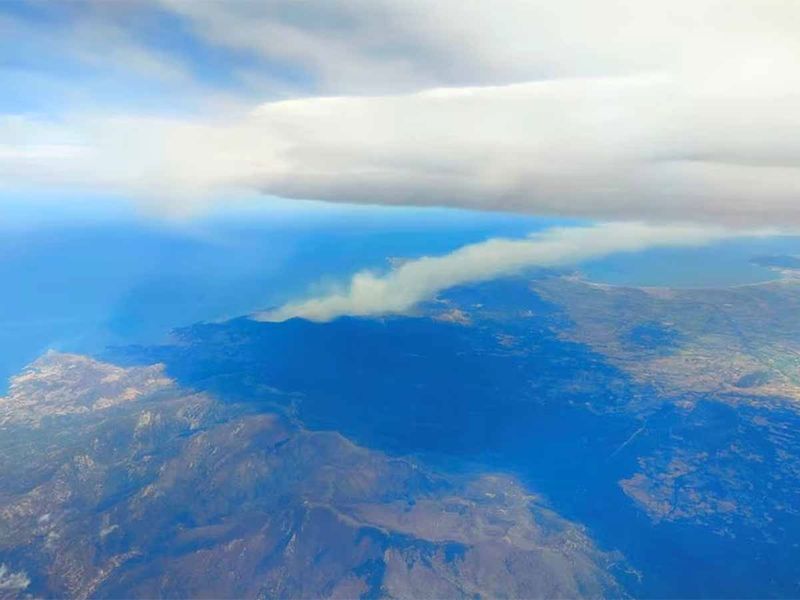 An aerial view shows smoke rising from a fire in the Cerbere region, France April 16, 2023 in this picture obtained from social media. 