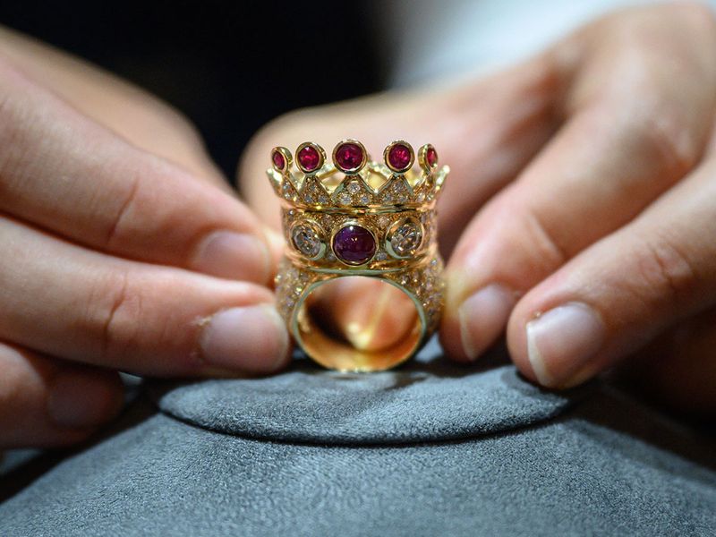 A gold, ruby, and diamond crown ring, designed and worn by the late US rapper Tupac Shakur during his last public appearance in 1996, is displayed during a press preview at Sotheby's in New York City on July 20, 2023. The ring will be auctioned during Sotheby's third annual Hip-Hop sale on July 25