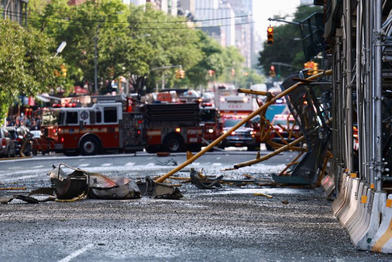 Copy of 2023-07-26T132328Z_1353556609_RC21B2AMGX2M_RTRMADP_3_NEW-YORK-CRANE-FIRE-1690381246652