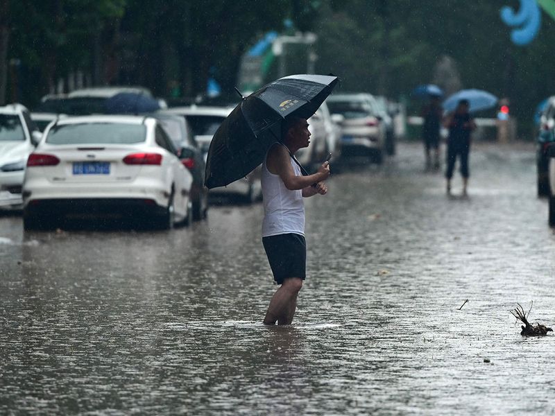China's capital records heaviest rainfall of year as Doksuri tapers off, Weather News