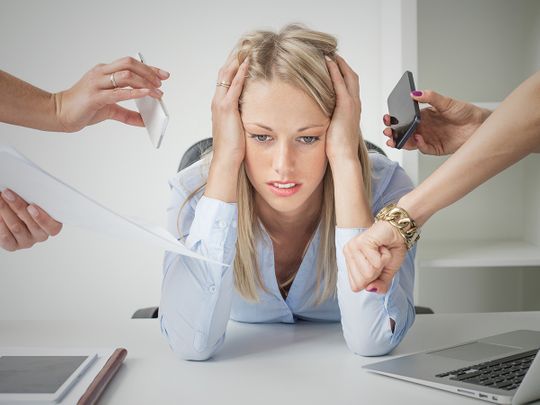 Overwhelmed person at office