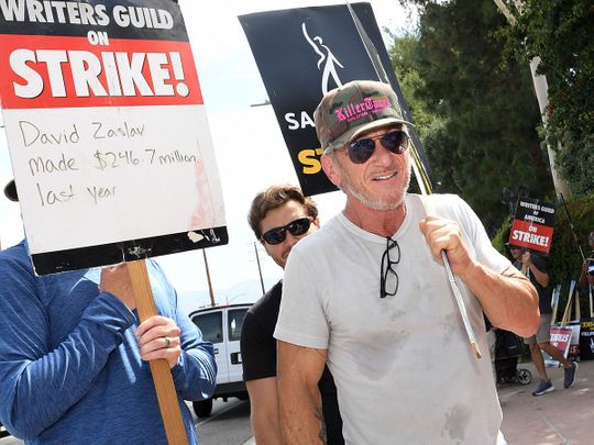 US actor Sean Penn joins members of the Writers Guild of America and the Screen Actors Guild as they walk a picket line outside of Walt Disney Studios in Burbank, California, on August 1, 2023. Tens of thousands of Hollywood actors went on strike at midnight July 14, 2023, effectively bringing the giant movie and television business to a halt as they join writers in the first industry-wide walkout for 63 years. 