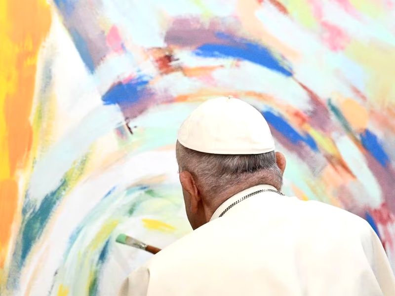 Pope Francis paints a mural 