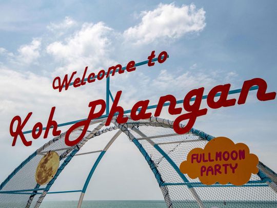 This file photo taken on November 28, 2021 shows a welcome sign at a pier on Koh Pha Ngan in the Gulf of Thailand