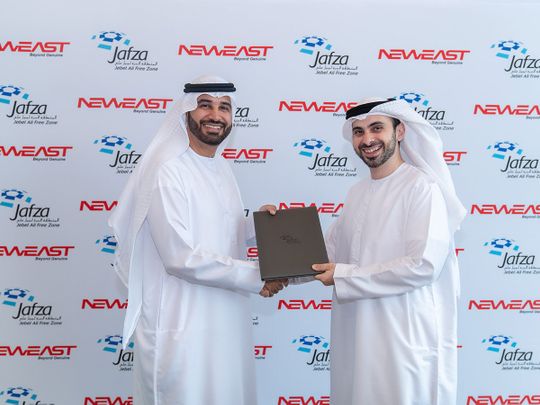 Henry Shaaya, Managing Director of Neweast General Trading and Abdulla Al Hashmi, COO of Parks and Zones, DP World UAE sign agreement.