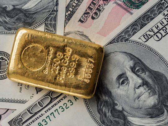 Stock - Gold and dollar
