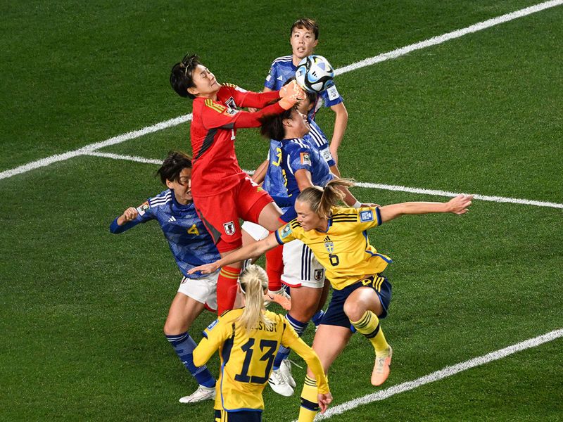 Japan's forward #09 Riko Ueki runs with the ball during the Australia and New Zealand 2023 Women's World Cup quarter-final football match between Japan and Sweden at Eden Park in Auckland on August 11, 2023. 