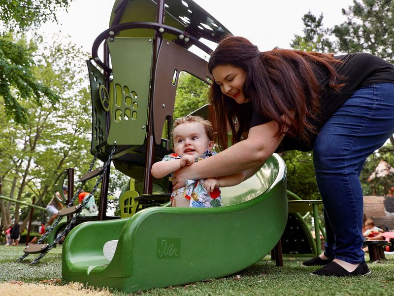 Elizabeth Kutschke spends time at the park with her 2-year-old son, Ben, who was diagnosed with spinal muscular atrophy, an inherited disorder