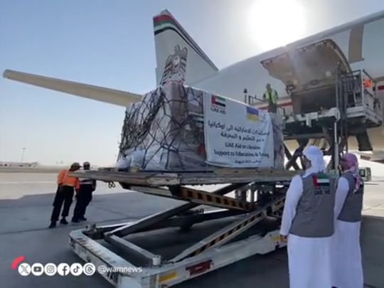 Still from video posted by WAM showing the school supplies being loaded by UAE for Ukraine