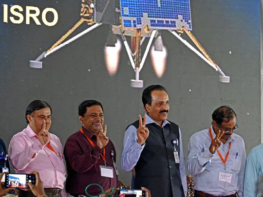 ISRO Chairman S. Somanath with others show victory sign after the successful soft-landing Chandrayaan-3 Lander Vikram on the surface of Moon during Chandrayaan-3 Mission, at ISRO in Bengaluru on Wednesday. 