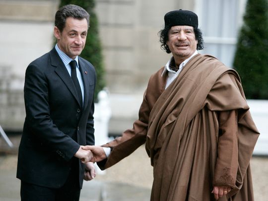 French President Nicolas Sarkozy  Libyan leader Col. Muammar Gadhafi