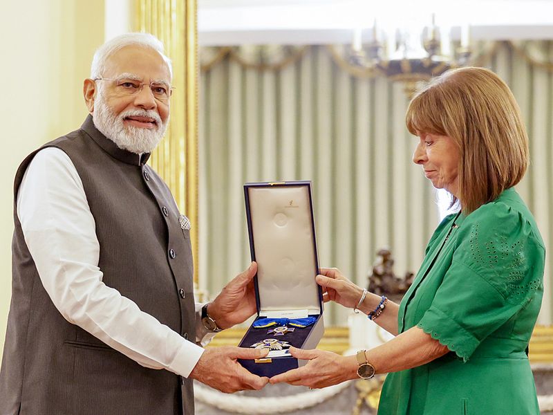 Indian Prime Minister Narendra Modi being conferred with the Grand Cross of the Order of Honour by Greek President Katerina N. Sakellaropoulou