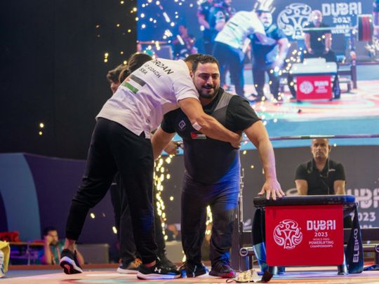 Abdelkareem Khattab celebrates his world record show with coach in Dubai.-1693422137942
