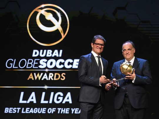 Javier Tebas Medrano, President of 'La Liga,' accepted the award for LaLiga as the 'Best League Of The Year' at the Dubai Globe Soccer Award, presented by Fabio Capello-1693401454356