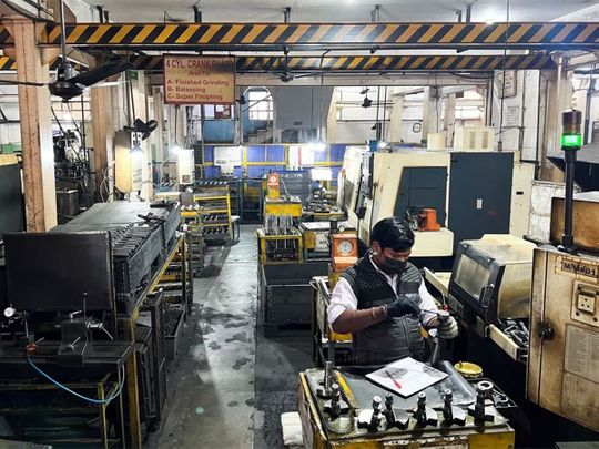 https://imagevars.gulfnews.com/2023/08/31/An-employee-works-inside-an-engineering-goods-export-unit-in-the-manufacturing-hub-of-Faridabad-on-the-outskirts-of-New-Delhi.-_18a49b1c095_medium.jpg