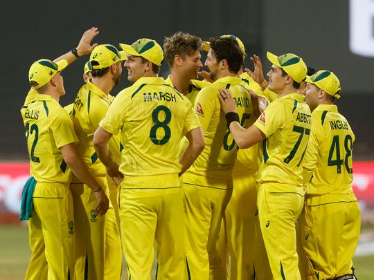 Australia players celebrate after the match. 