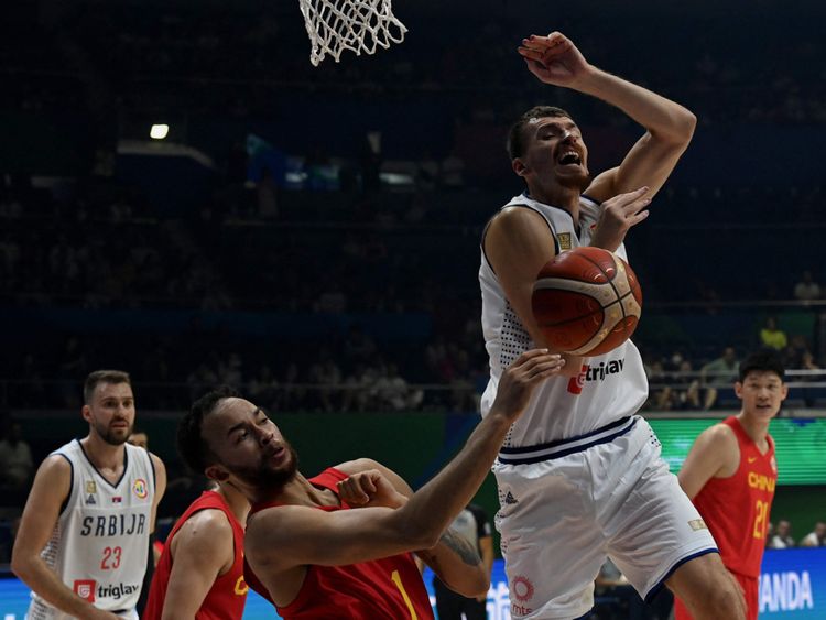 Serbia moves into World Cup semifinals by beating Lithuania, which