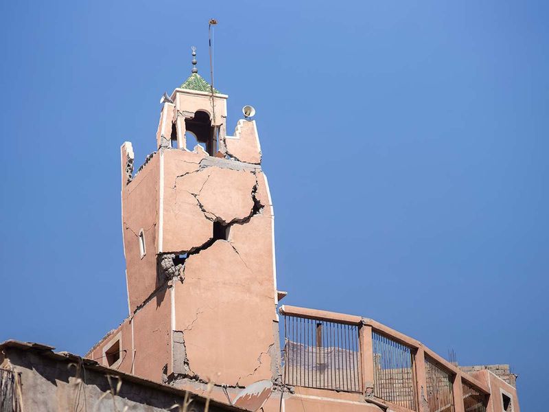 A cracked mosque minaret stands after an earthquake in Moulay Brahim village, near Marrakech, Morocco, Saturday, Sept. 9, 2023.