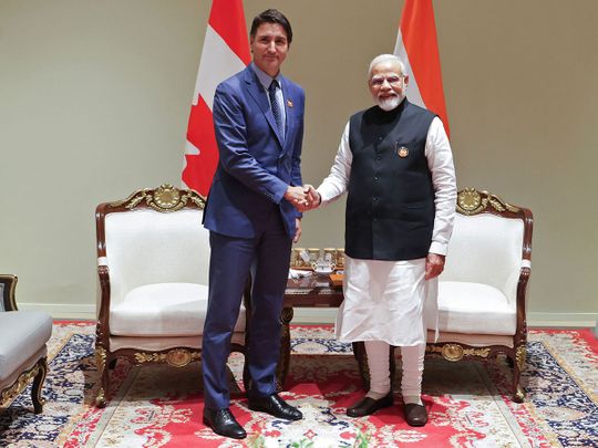 India's Prime Minister Narendra Modi (R) and his Canada counterpart Justin Trudeau shake hands during a bilateral meeting after the G20 Summit in New Delhi on September 10, 2023