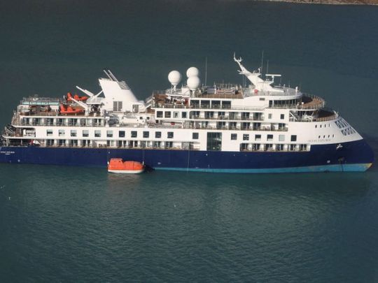View of the Ocean Explorer, a luxury cruise ship carrying 206 people that ran aground, in Alpefjord, Greenland, September 12, 2023. 