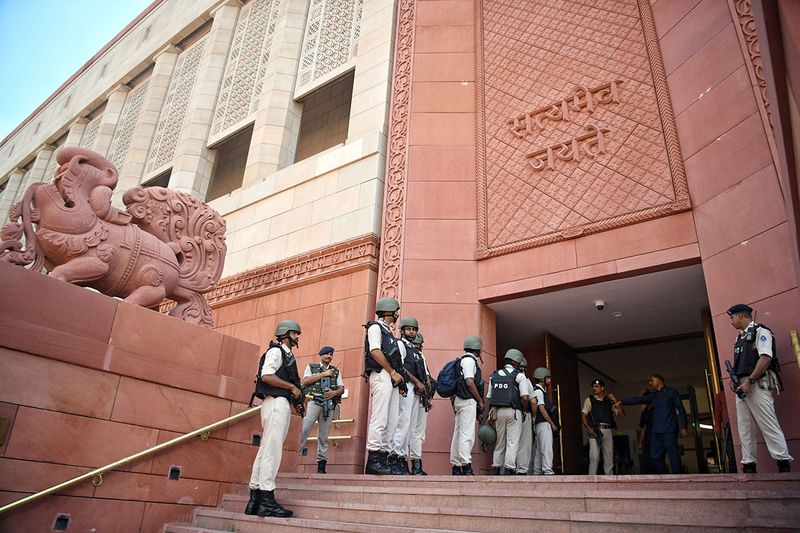 Parliament Duty Group (PDG) personnel stand guard at the New Parliament Building during the Special Session, in New Delhi on Tuesday.