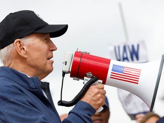 Look: Biden makes history by joining UAW picket line