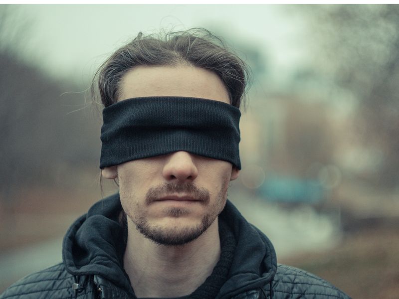 Person with blindfold