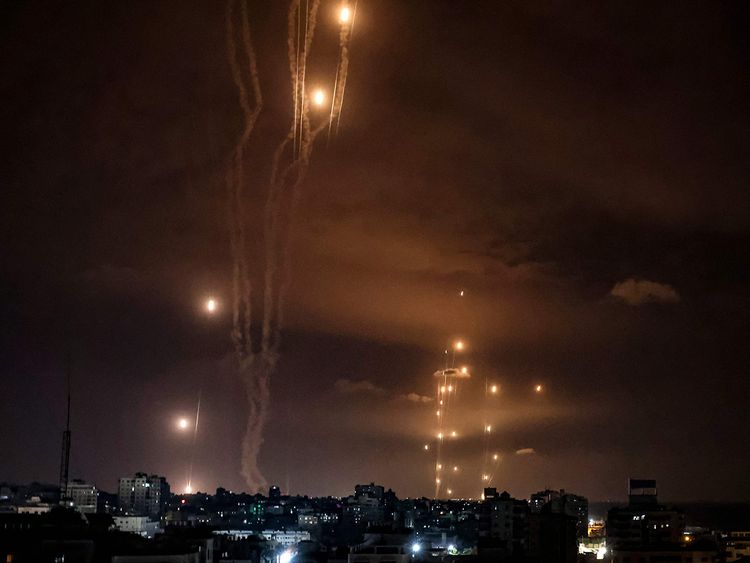 Rockets fired by Hamas militants from Gaza City, are intercepted by the Israeli Iron Dome defence missile system on October 7, 2023. 